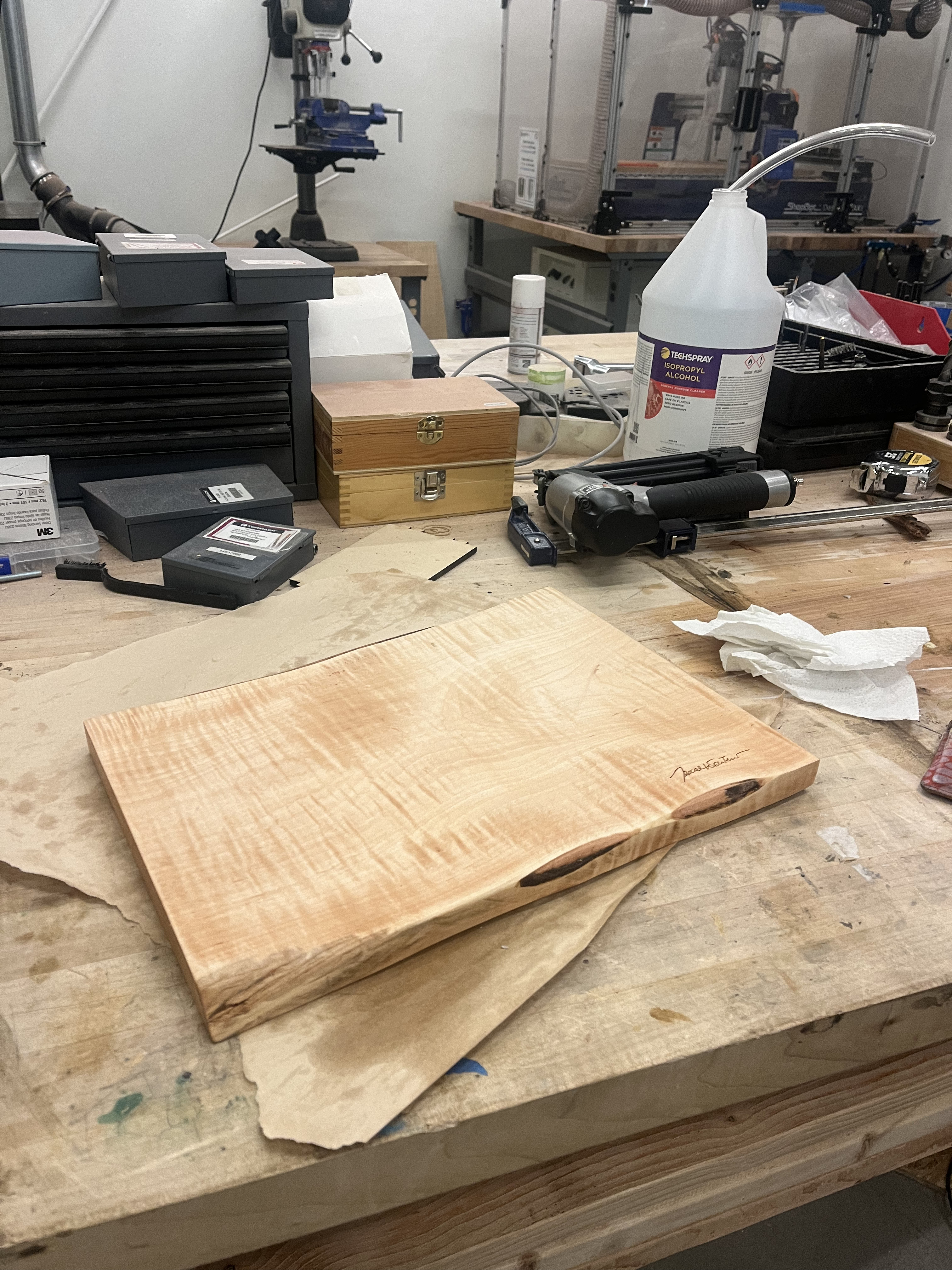 Handcrafted wooden charcuterie board with beautiful grain patterns