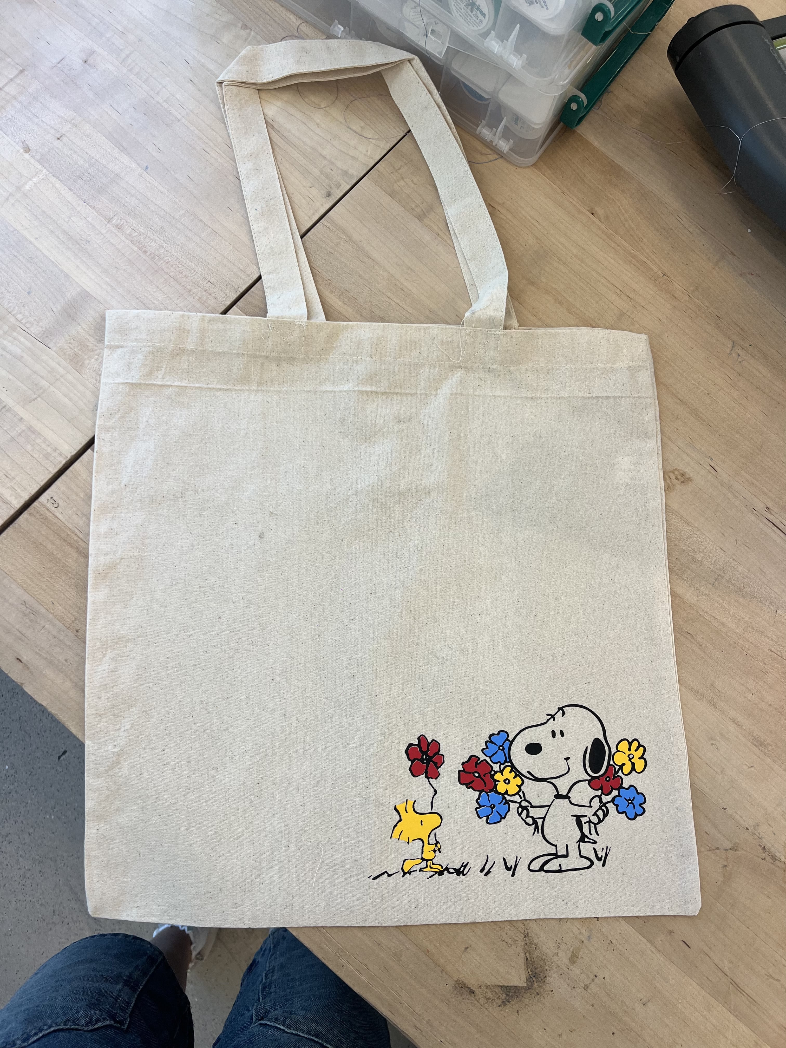Canvas tote bag with colorful Snoopy and Woodstock embroidered design